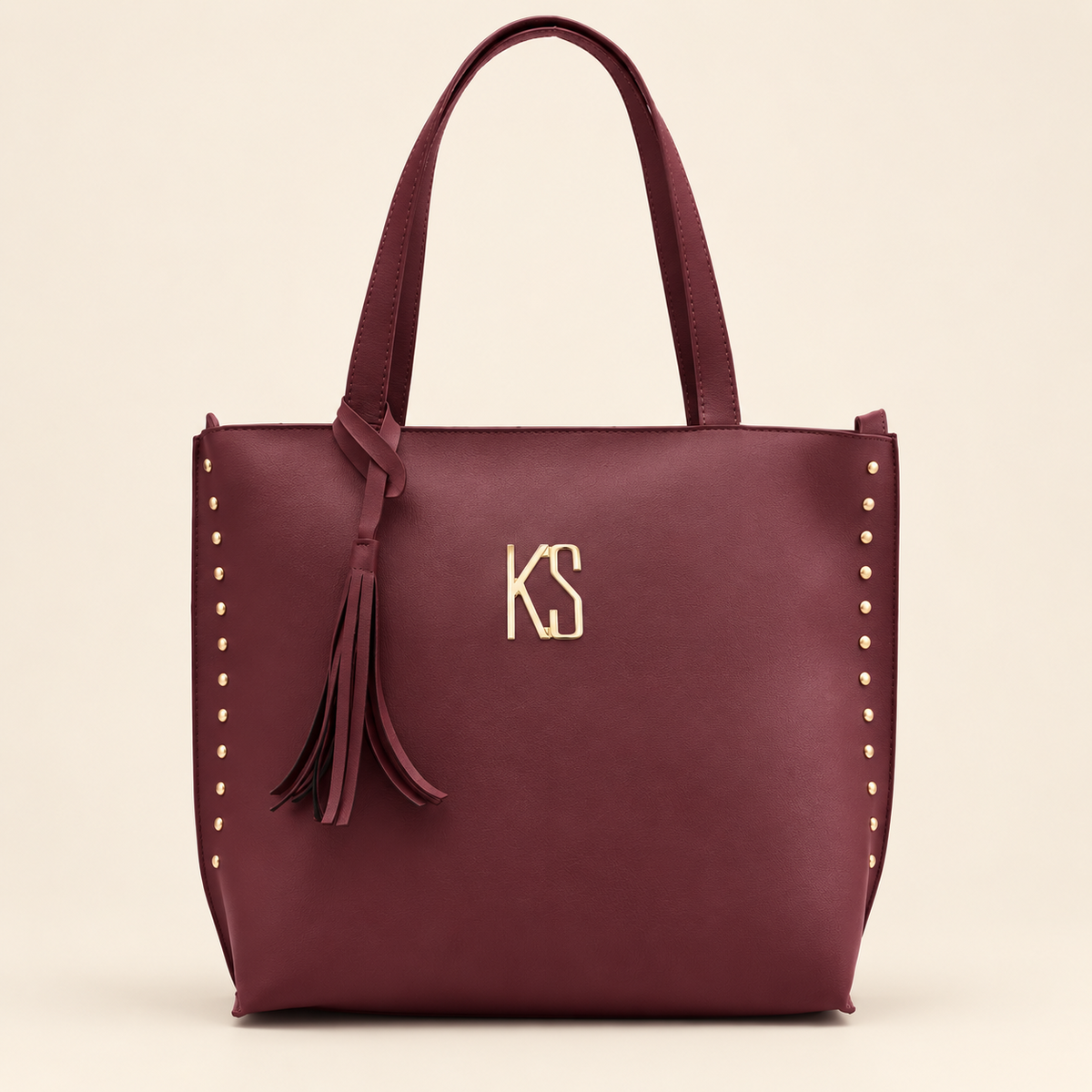 Bolsa London vinho sozinha em fundo bege
