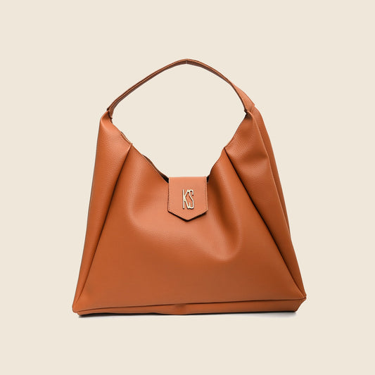 Bolsa Veneza caramelo em fundo bege