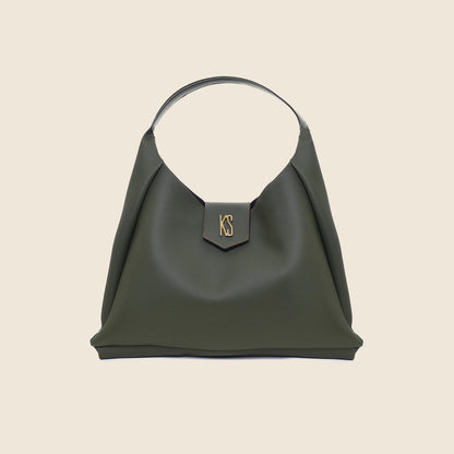 Bolsa Veneza verde em fundo bege